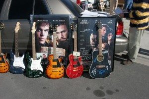 Autographed guitars and movie posters