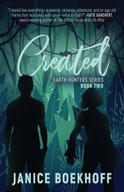 Book cover for 'Created,' the second book in the Earth Hunters series by Janice Boekhoff. The design features silhouettes of two people facing away from the viewer, standing amidst dense, dark foliage and a light turquoise background. The title 'Created' is written in large, white, stylized font