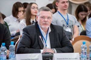 Oleg Konovalov Speaking At A Conference