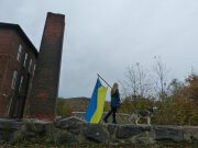 Adoriana Marik with Ukrainan Flag and dog